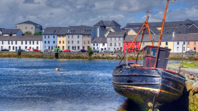 A picture of a boat at The Long Walk, Galway Ireland. Oranmore Lodge Hotel in the best family hotel in Ireland with a swimming pool and located minutes from all of the best things to see and do in Galway, Ireland.
