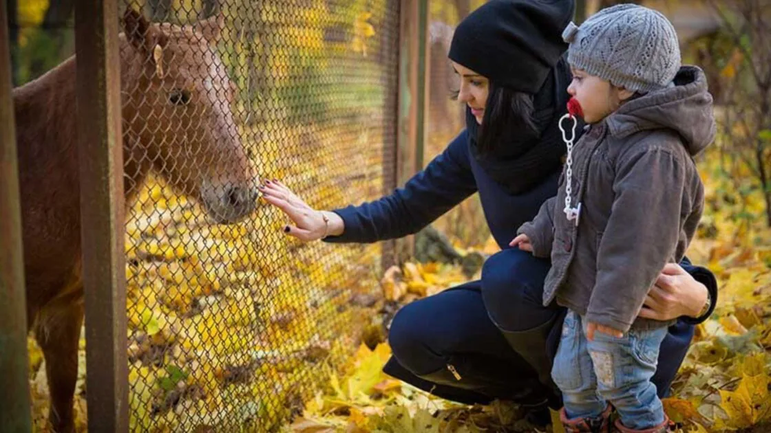 Family At Petting Farm